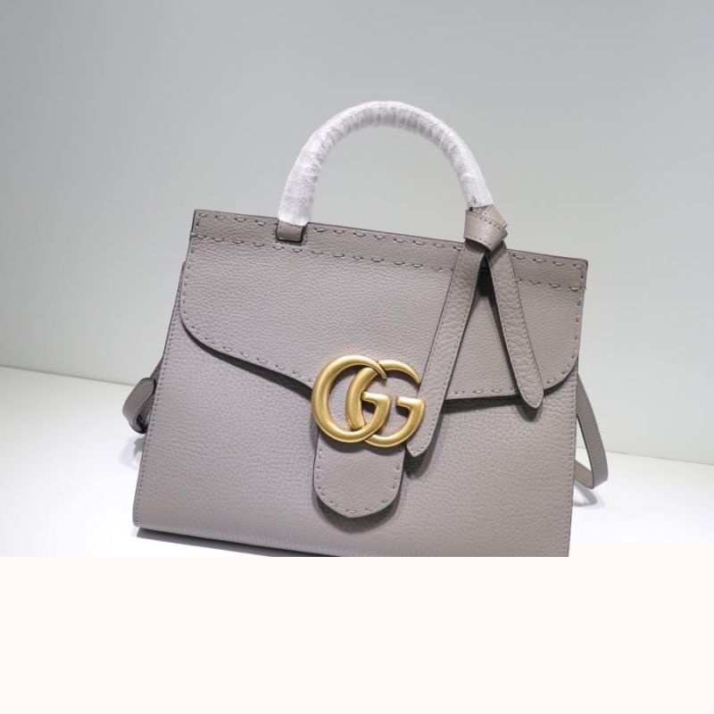 G*u*i top handle bags